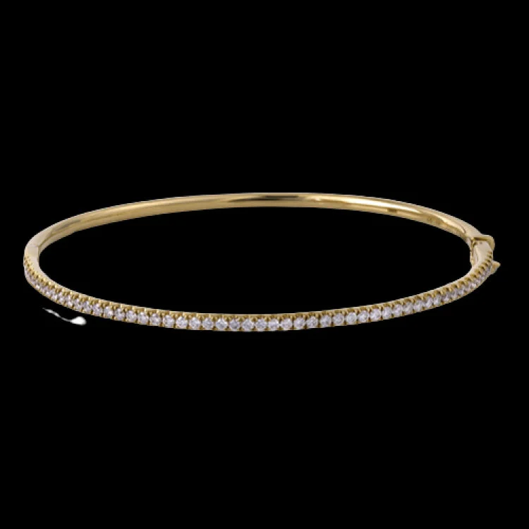 bracelets and bangles with blue topaz -Featuring a charming classic style, this yellow gold bangle bracelet is inset with .86 ctw of dazzling round white diamonds in a lovely channel setting. Perfect for stacking.