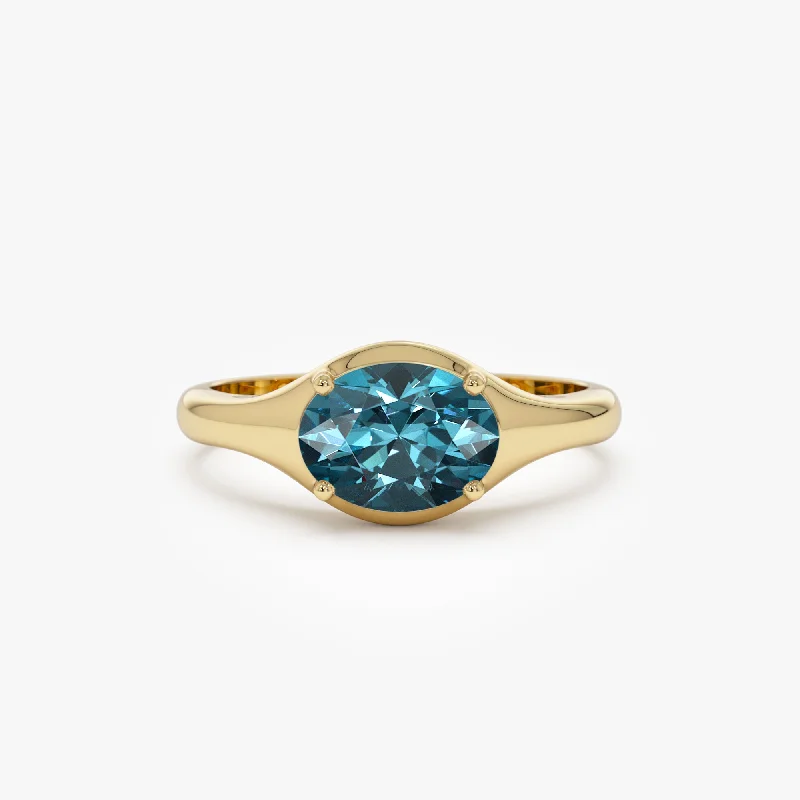 Women's rings with modern geometric designs-14K Oval Shape Prong Setting London Blue Topaz Ring