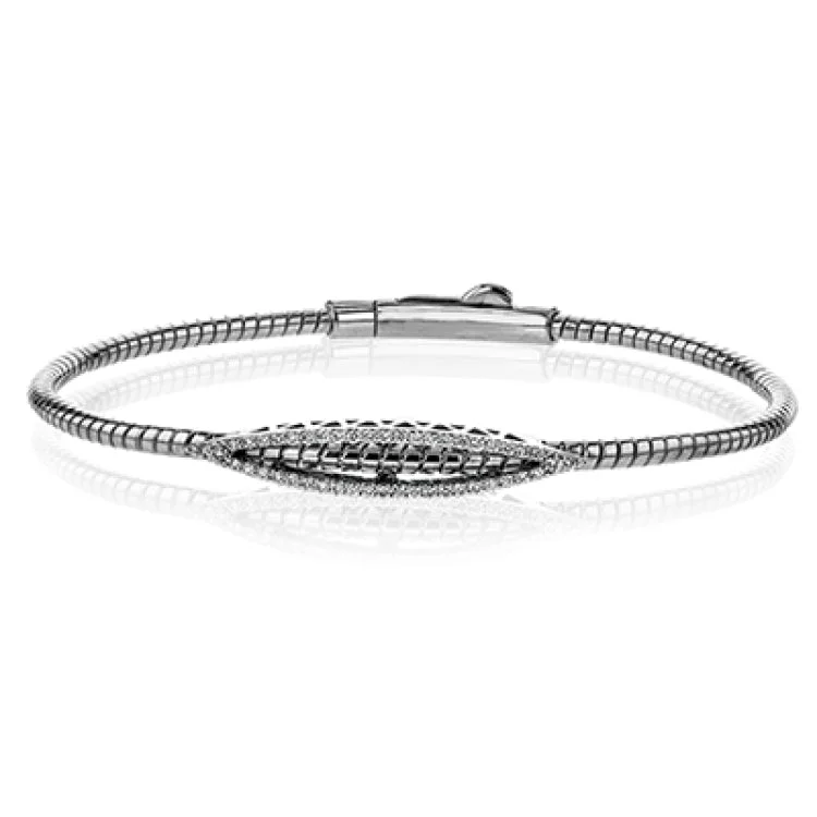 bracelets and bangles affordable luxury -This sleek bracelet made of flexible 18K gold and diamond accent design 0.23 ctw., with a secure magnetic closure makes a great layering piece