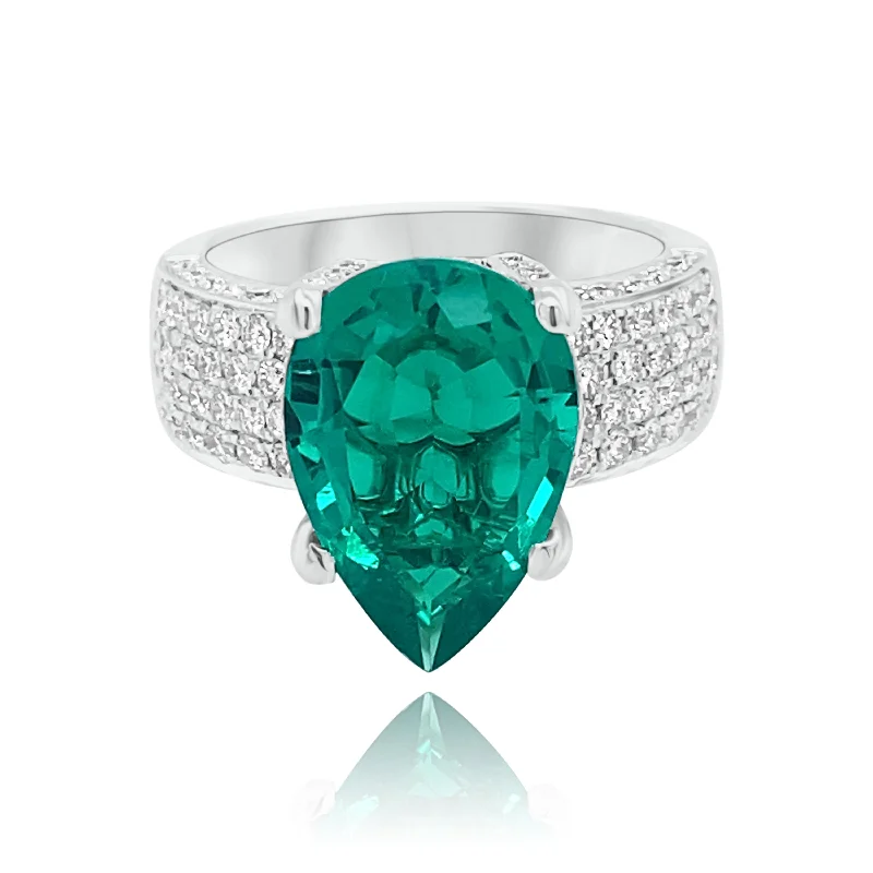 Women's rings for engagement with modern appeal-Pear shape Emerald & Diamonds Ring