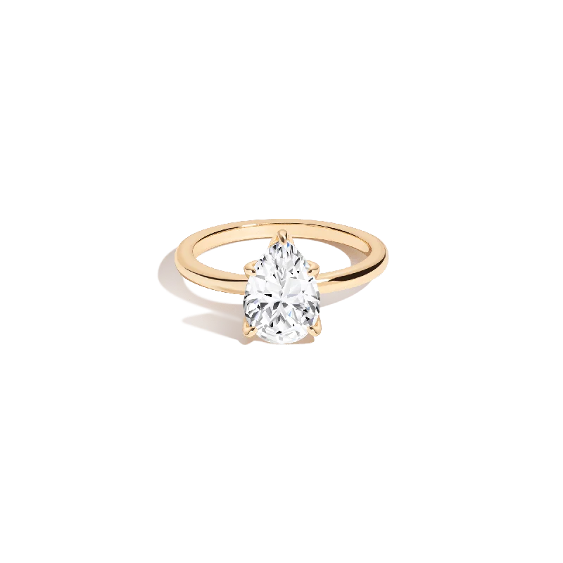 Trendy women's rings with twisted bands-Pear Lab Grown White Sapphire Solitaire Ring