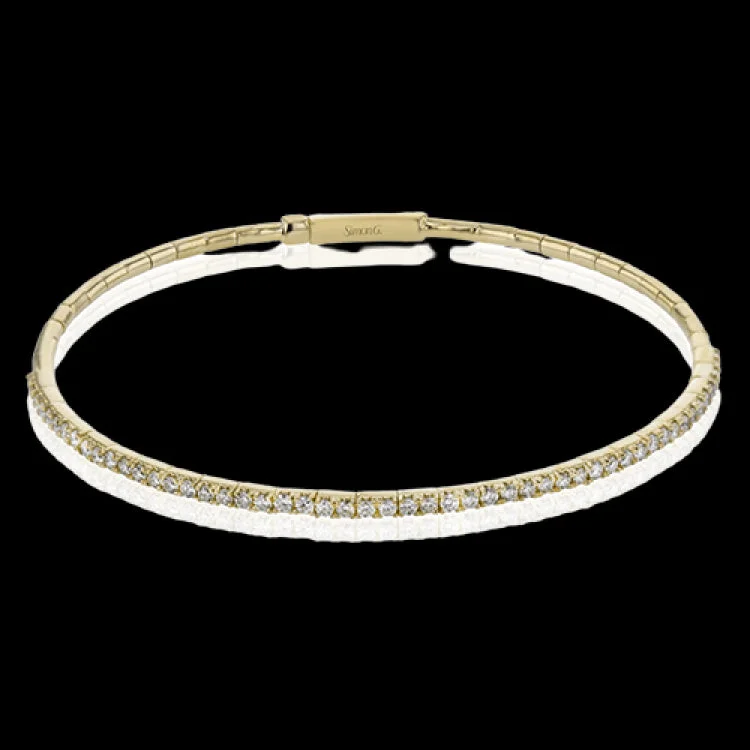 bracelets and bangles with gold plating -This 18K yellow gold bangle bracelet featuring .76ctw diamonds is perfect for everyday wear or a night out on the town. This wardrobe staple pairs perfectly with any jewelry collection.