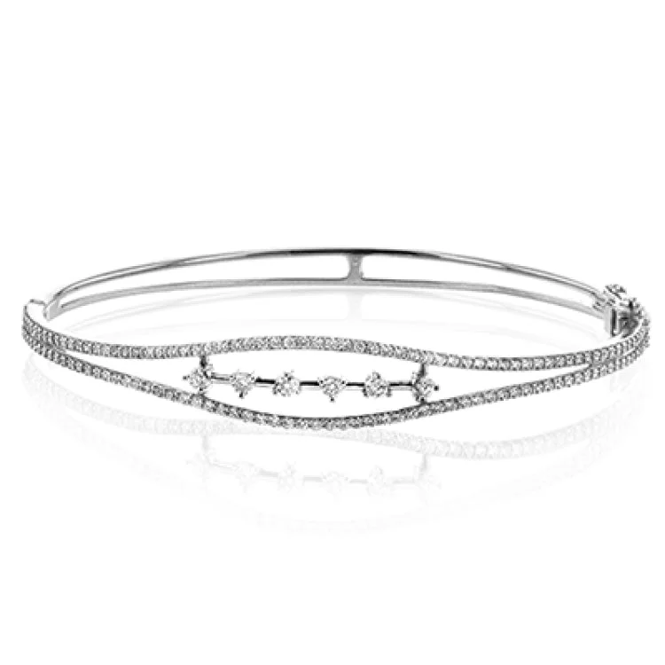 bracelets and bangles thin bangle -This bracelet brings deco style into the modern day, featuring a tapering design that is set with .72 ctw of white diamonds.