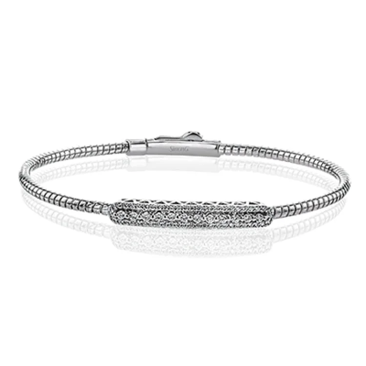 bracelets and bangles with black diamond -This sleek bracelet made of flexible 18K gold features a vintage diamond plaque 0.40 ctw., with a secure magnetic closure and makes a great layering piece